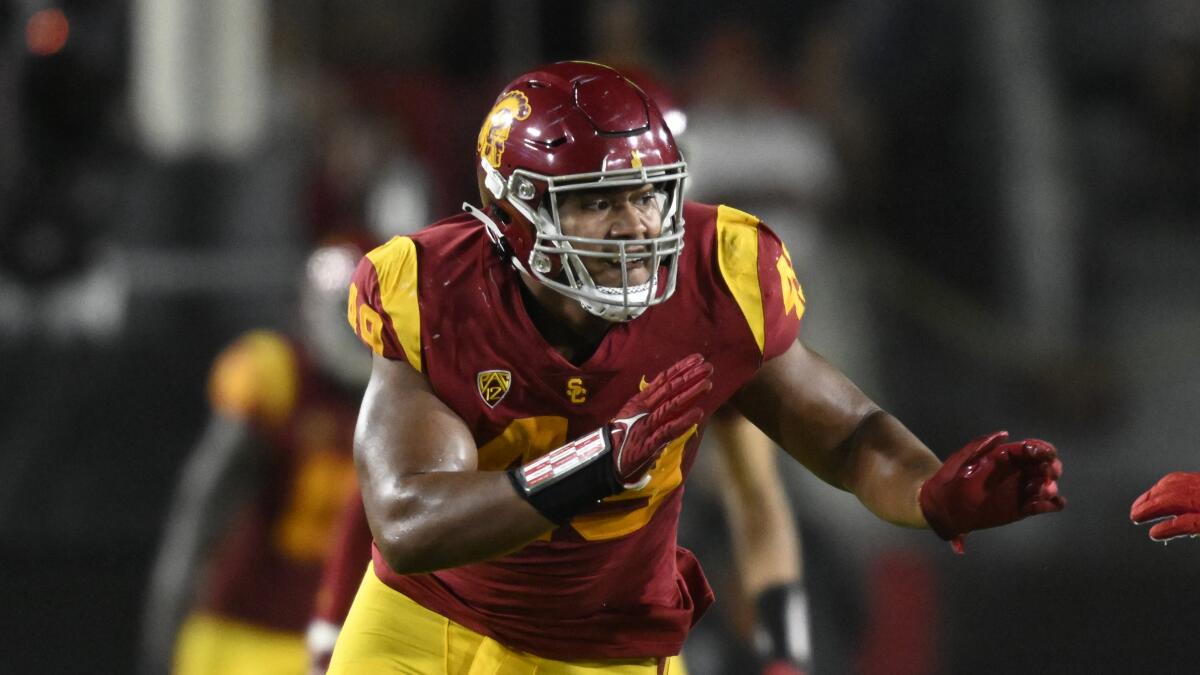 USC defensive lineman Tuli Tuipulotu pursues the ball against Fresno State on Sept. 17.