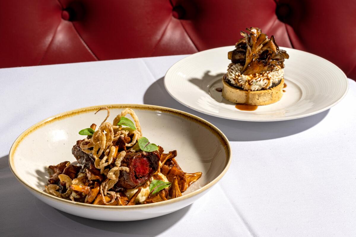 Eggplant Fillet and Mushroom Tart in a booth at Crossroads Kitchen in Los Angeles.