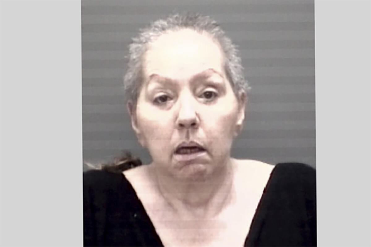This photo provided by the Eaton County Sheriff's Office shows Beverly McCallum, who is accused in the 2002 fatal bludgeoning of her husband in Michigan, and has been ordered held on a $10 million bond following her return to the U.S. from Italy. McCallum was arraigned on charges of second-degree murder and disinterment/mutilation of a body, the Eaton County sheriff's office said Monday July 11, 2022. McCallum had been in custody in Rome since February 2020. (Eaton County Sheriff's Office via AP)
