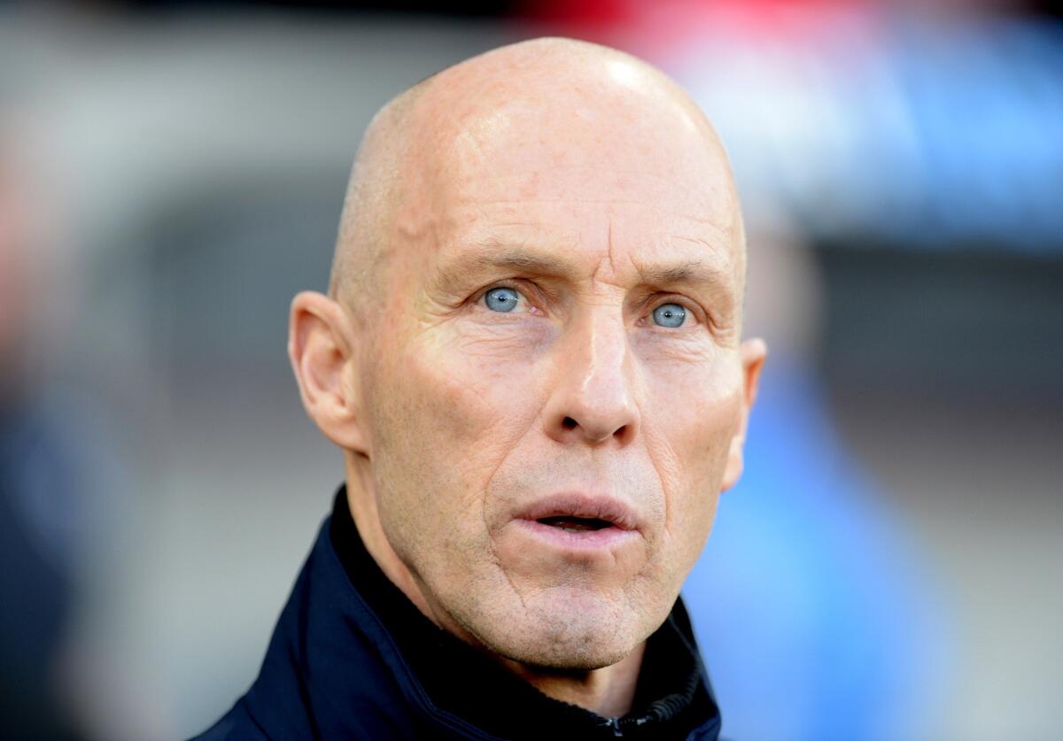 Swansea manager Bob Bradley watches the action during their English Premier League match against West Ham United on Dec. 26.