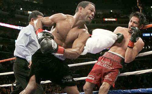 Shane Mosley finishes a flurry that led to Antonio Margarito's corner throwing in the towel in the ninth round of their WBA welterweight championship fight Saturday night at Staples Center.