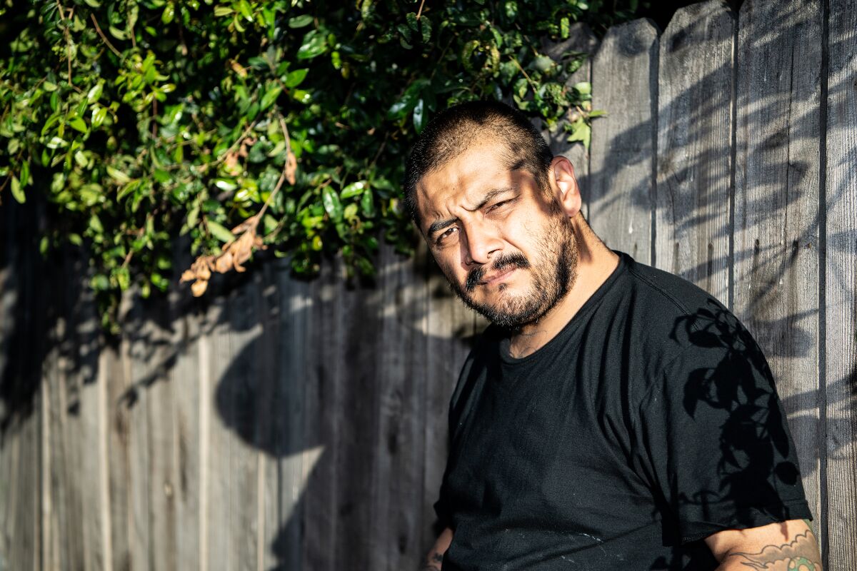 Tony Ruiz poses for a portrait near his sister's residence in Inglewood.