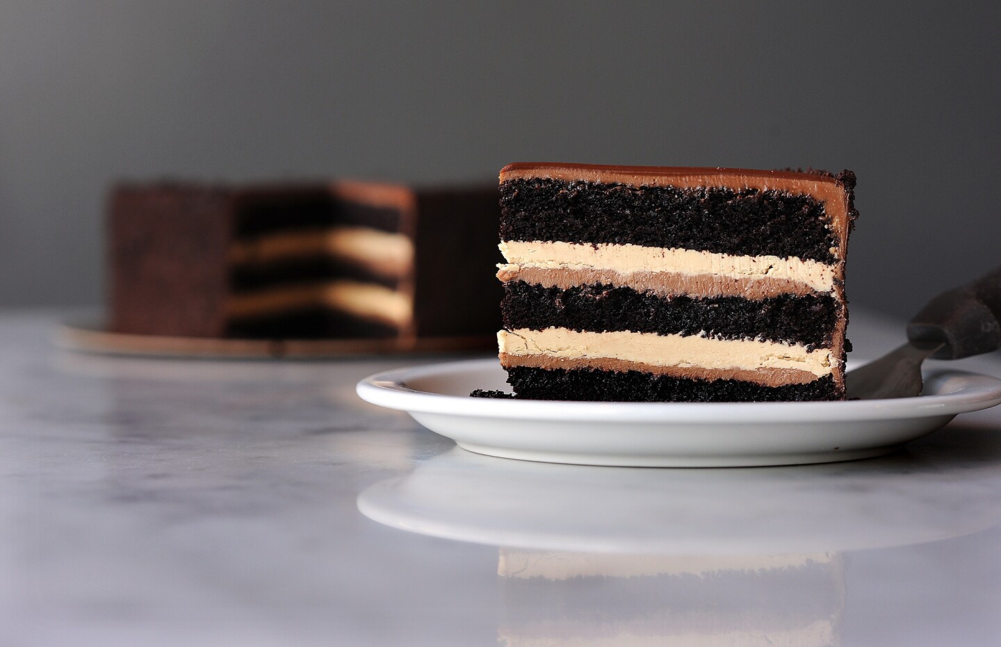 There are layers of chocolate cake, milk chocolate crémeux, espresso buttercream -- topped with bittersweet chocolate glaze -- in the chocolate espresso layer cake that Na Young Ma makes at Proof Bakery in Atwater Village.