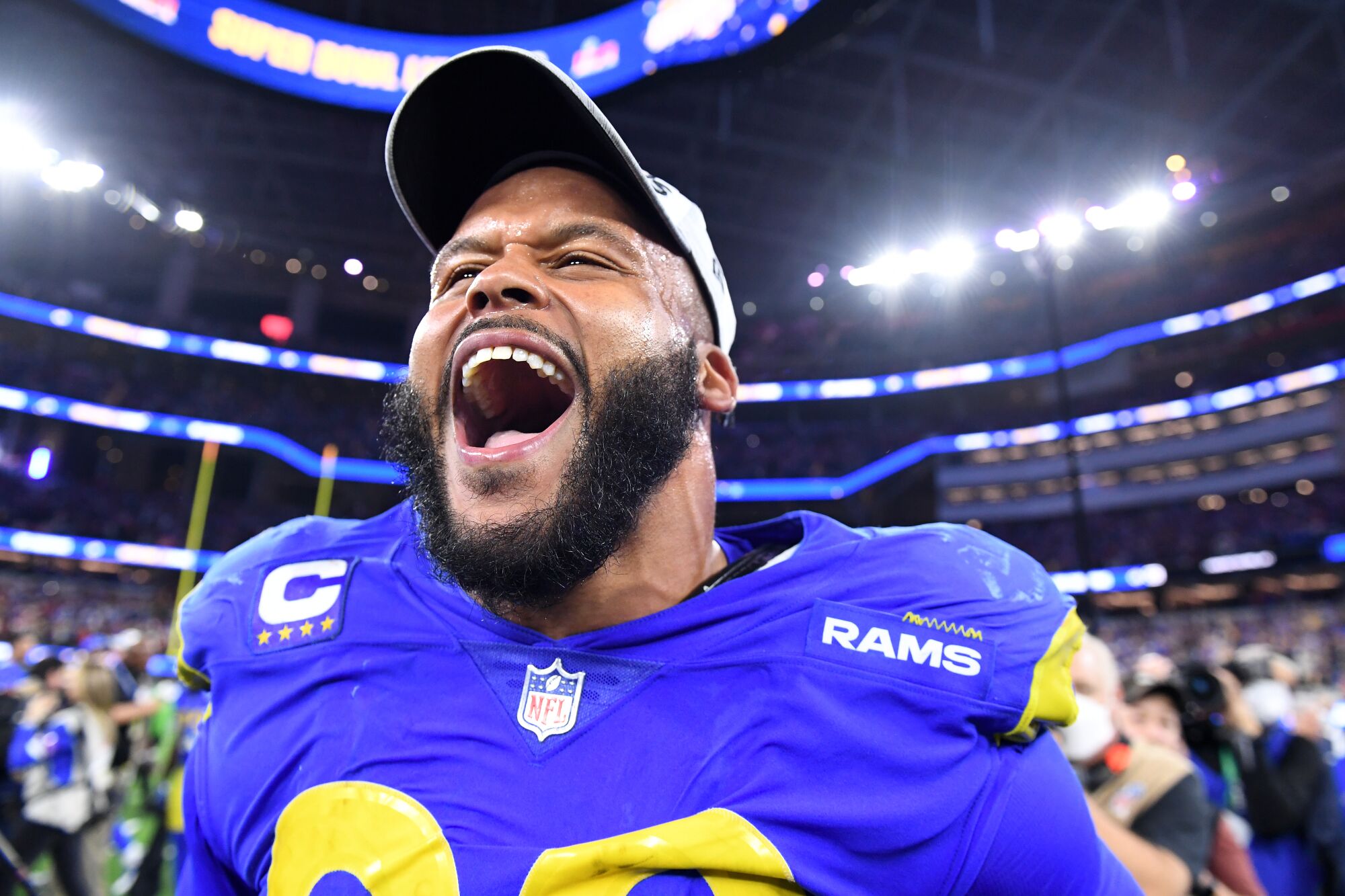 Rams defensive lineman Aaron Donald celebrates the Rams' NFC championship win.
