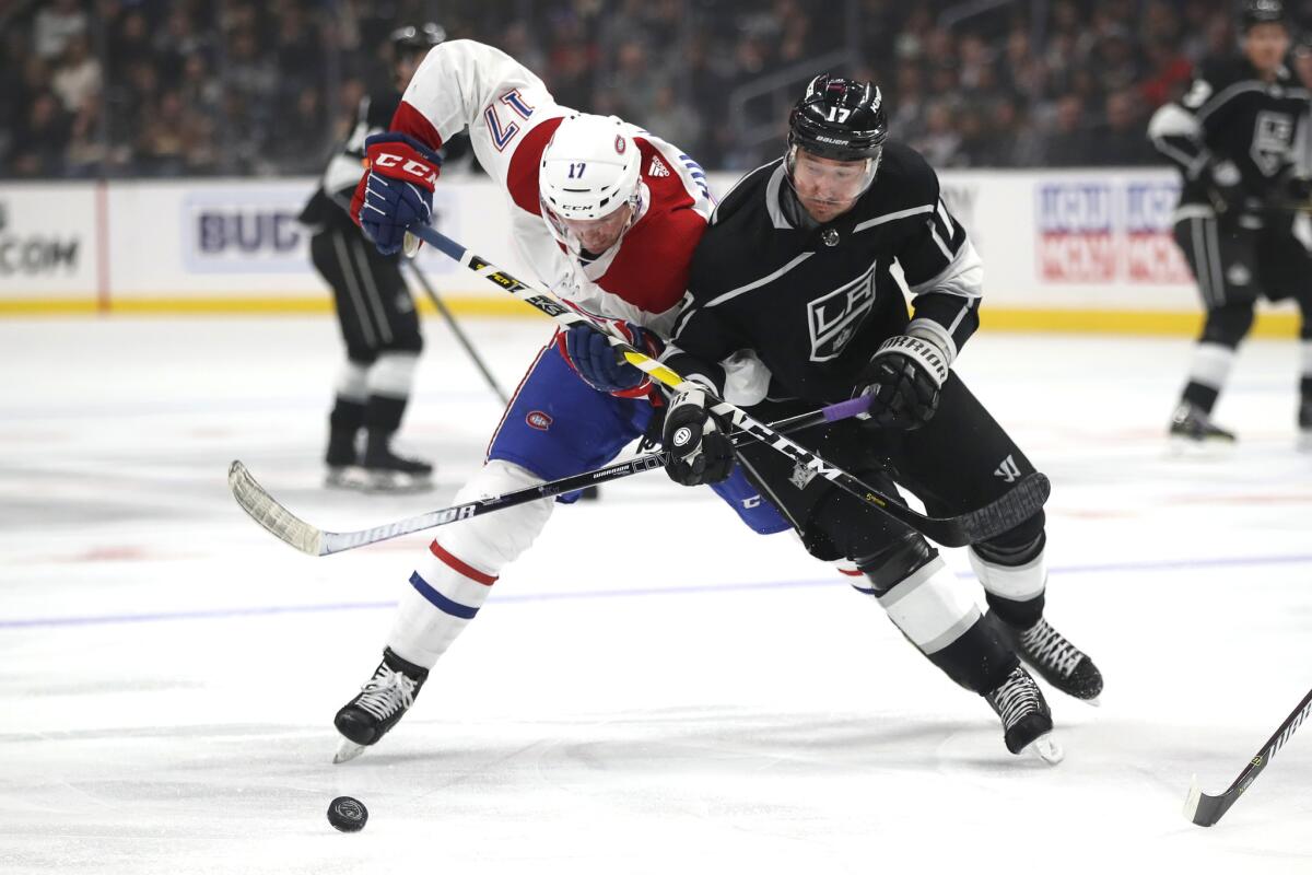The Montreal Canadiens' Brett Kulak battles the Kings' Ilya Kovalchuk for position during a March 5 gameat Staples Center.