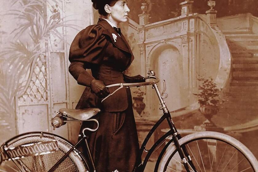 An archival photograph of Annie Londonderry, who biked around the world in the 1890s.  