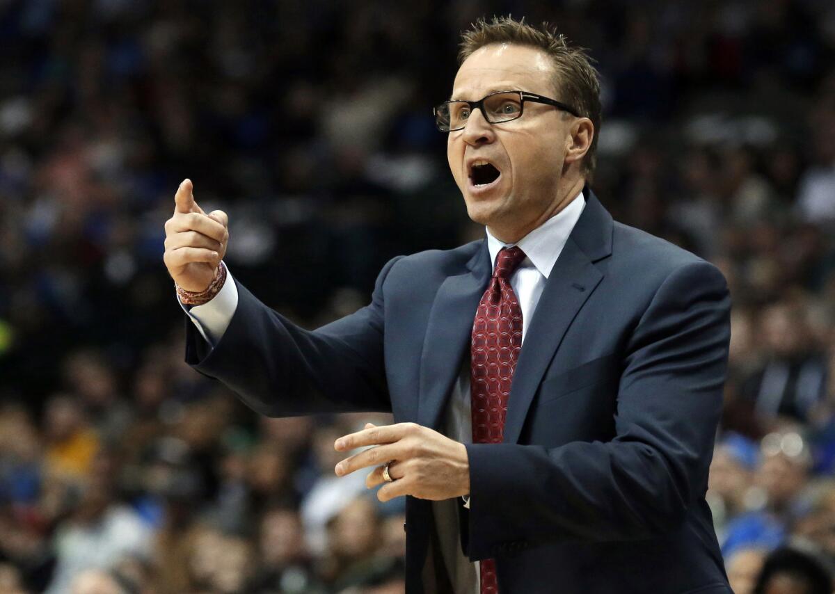 Scott Brooks yells from the Oklahoma City Thunder sideline during the first half of a game against the Mavericks on Dec. 28, 2014.