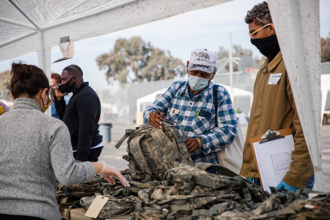 U.S. Army veteran Ruperto received a backpack and other items during the annual “Stand Down” event.