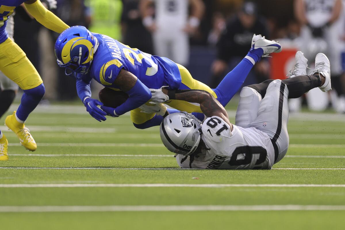 Rams maintain off Raiders to finish second two-game dropping streak as protection shines 1 Rams safety Jaylen McCollough (39) intercepts a pass intended for Raiders wide receiver DJ Turner (19).