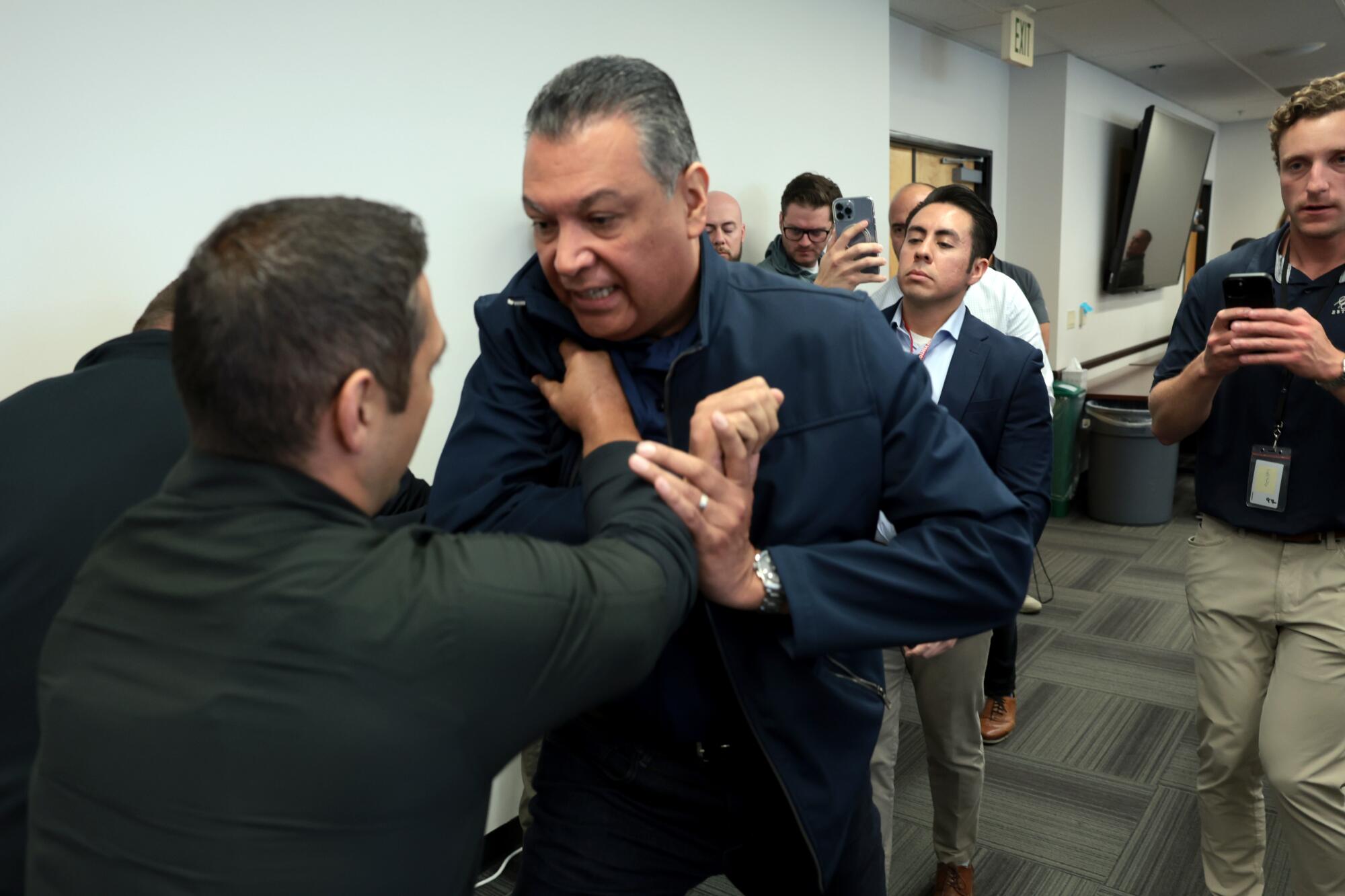 Photographer captures Sen. Alex Padilla's takedown - Los Angeles Times