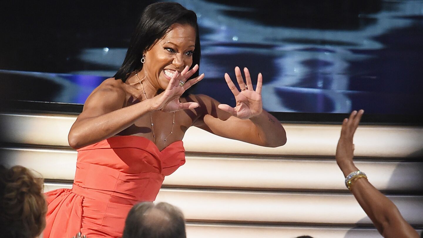 "American Crime" actress Regina King celebrates her win for supporting actress in a limited series or movie.