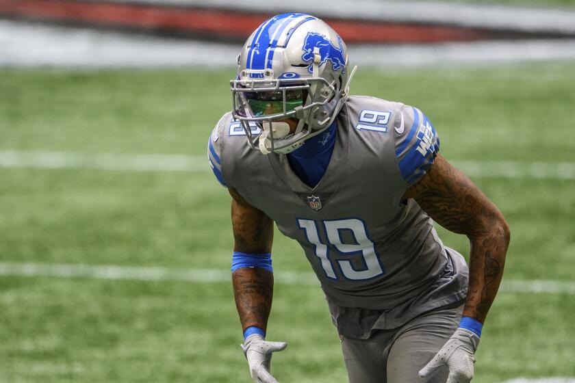 Detroit Lions wide receiver Kenny Golladay (19) works against the Atlanta Falcons.