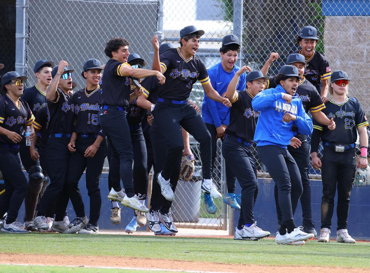 La Mirada players react to three-run home run by Kevin Jeon in 4-2 win over Warren on Monday.