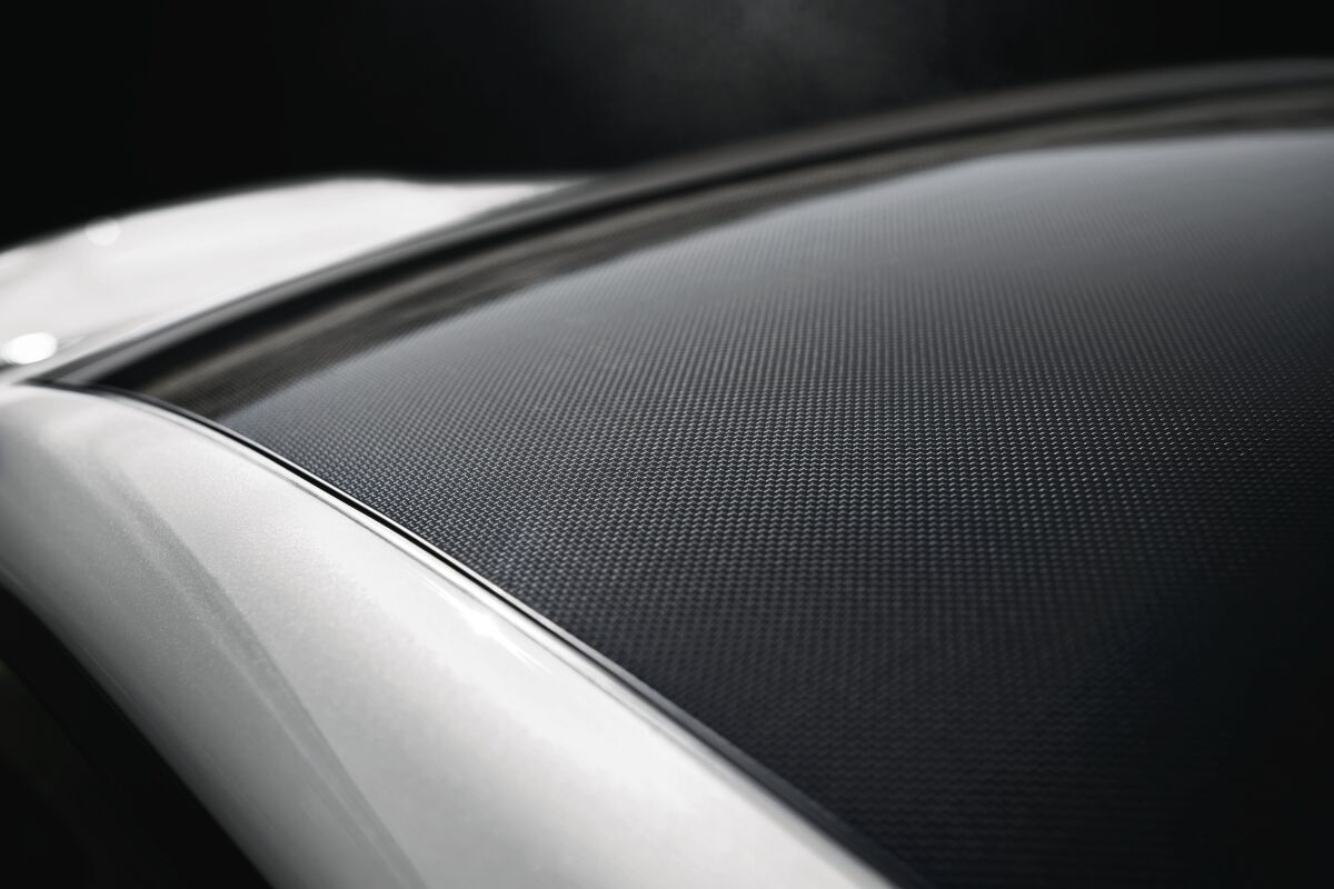 The lightweight carbon-fiber roof helps lower the center of gravity.