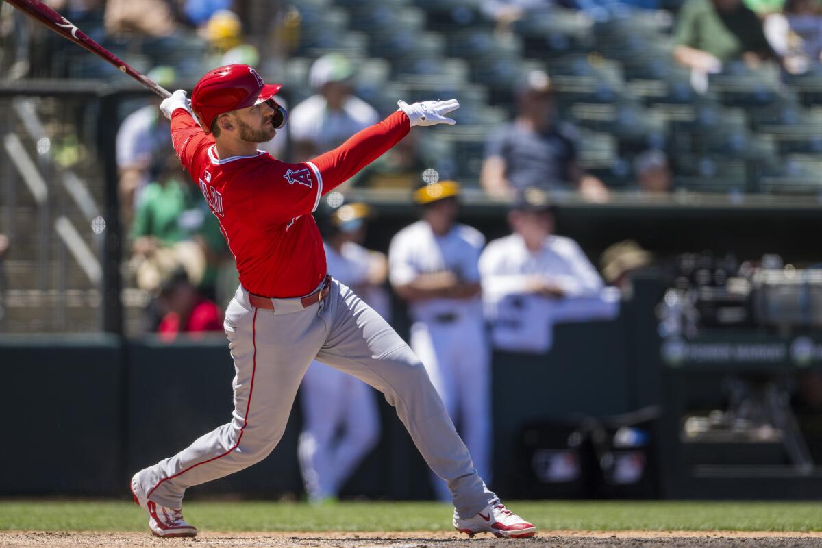 Los Angeles Angels' Taylor Ward hits a grand slam during the seventh inning.