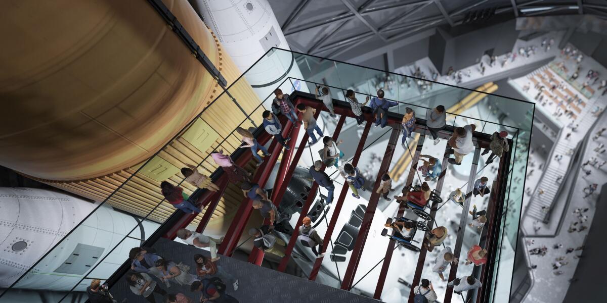 A rendering shows a platform letting visitors look up close at Endeavour's fuel tank.