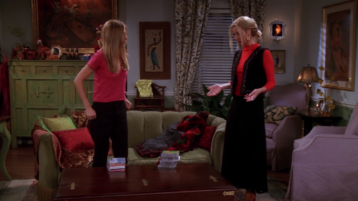 Jenifer Aniston and Lisa Kudrow looking at a Pottery Barn table