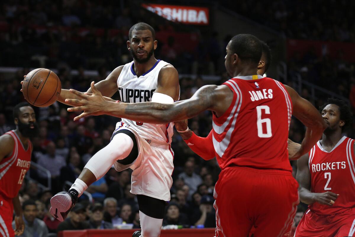 Chris Paul looks for a passing lane against the Houston Rockets.