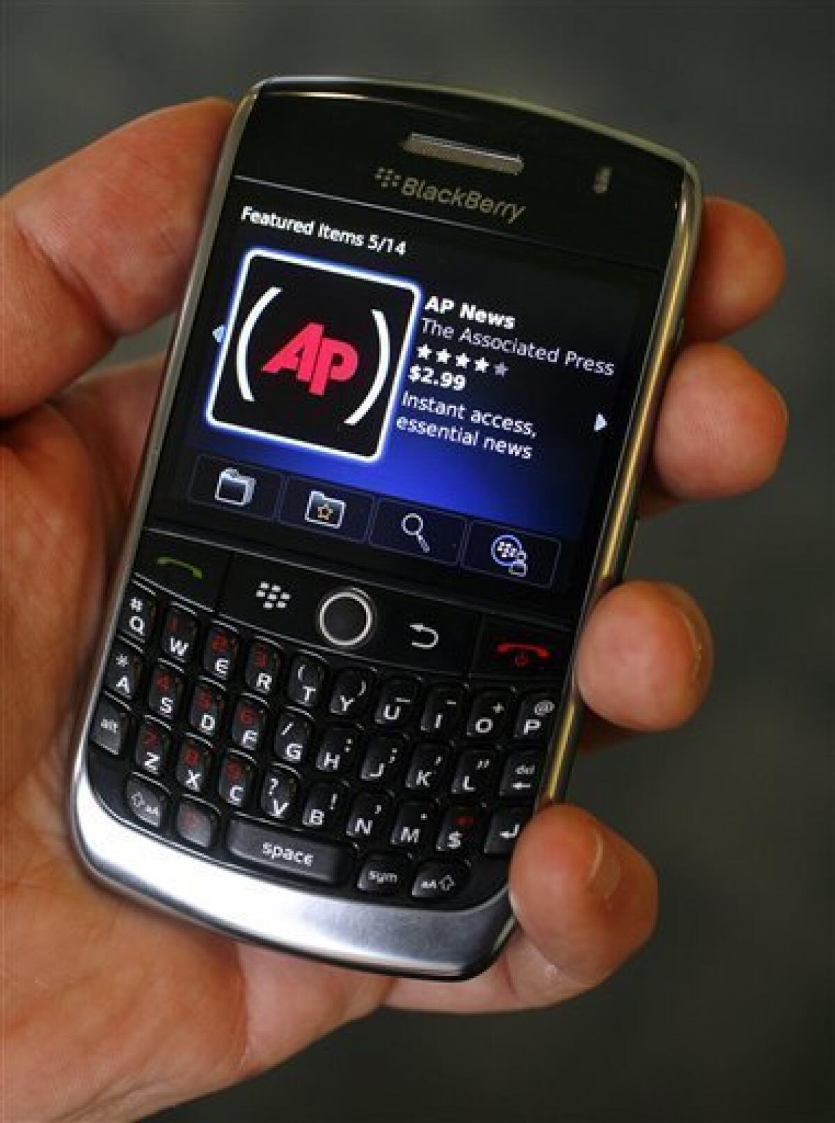 The BlackBerry App World application is shown in use on a Blackberry Curve 8900, Wednesday, April 15, 2009, in New York. (AP Photo/Peter Morgan)