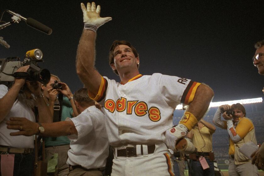 Steve Garvey waves while sporting the Padres’ uniform from 1984, when they went to the World Series.