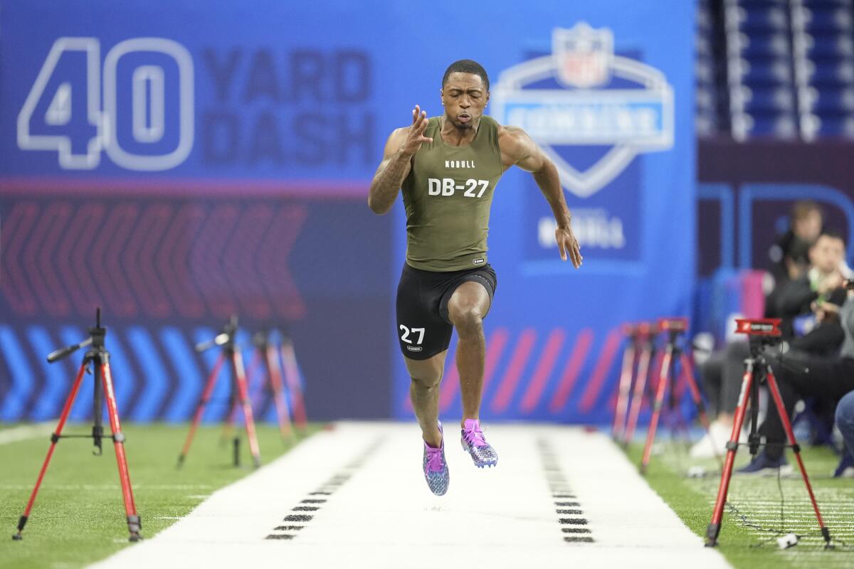 Toledo defensive back Quinyon Mitchell runs the 40-yard dash at the NFL scouting combine on Friday.