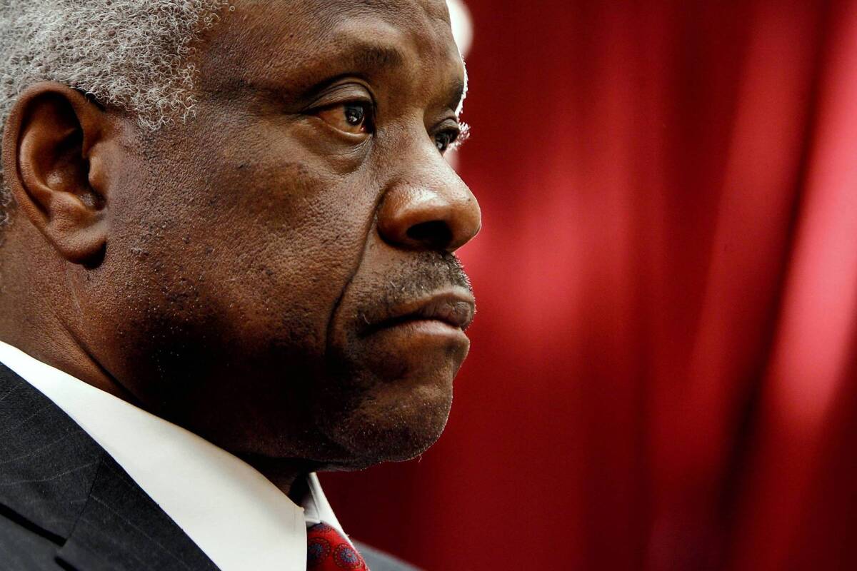 Supreme Court Justice Clarence Thomas, who rarely speaks during court arguments, spoke to the Federalist Society at a dinner for the conservative lawyers group.