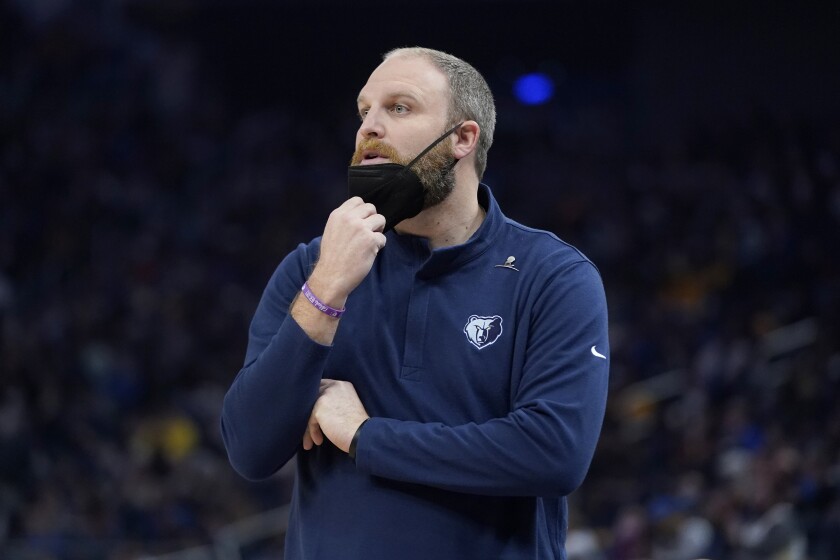 Memphis Grizzlies head coach Taylor Jenkins watches during the first half of his team's NBA basketball game against the Golden State Warriors in San Francisco, Thursday, Dec. 23, 2021. (AP Photo/Jeff Chiu)