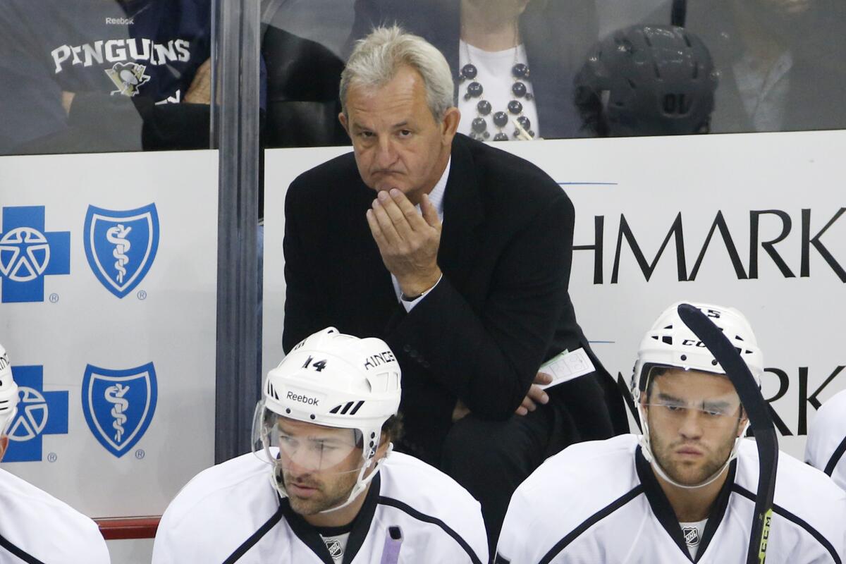 Kings Coach Darryl Sutter looks on as his team takes on Pittsburgh on Oct. 30.