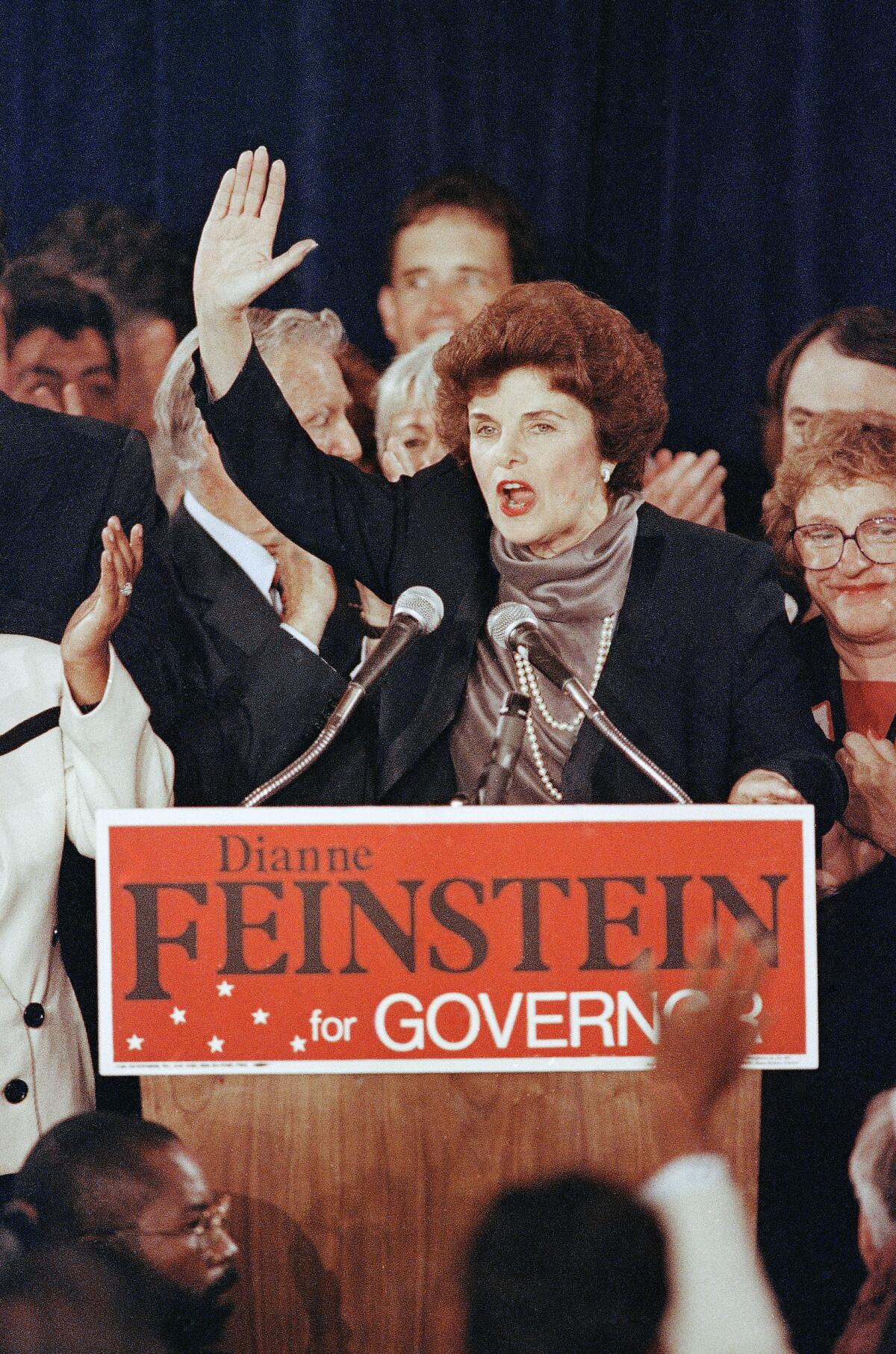 Gubernatorial candidate Dianne Feinstein waves to supporters after winning the Democratic nomination
