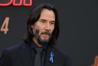 Keanu Reeves poses at the premiere of the film "John Wick: Chapter 4," Monday, March 20, 2023, at the TCL Chinese Theatre in Los Angeles. (AP Photo/Chris Pizzello)