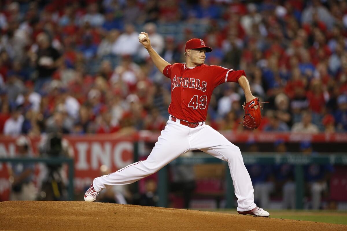 Angels starter Garrett Richards delivers a pitch against the Cubs on opening day.