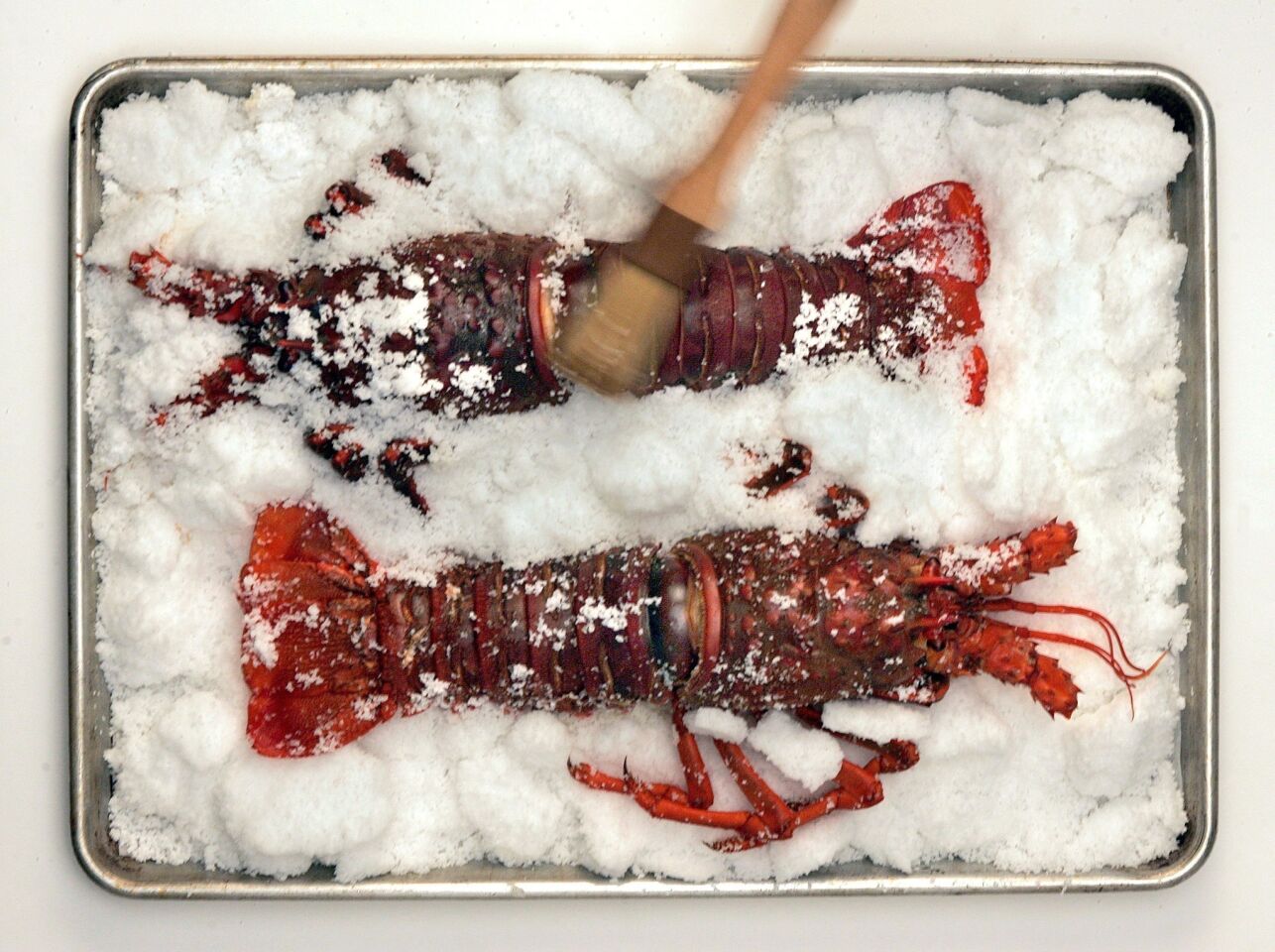 The salt crust retains moisture and deep flavor, making for an intensely-flavored dish. Recipe: Salt-roasted spiny lobster with saffron aioli