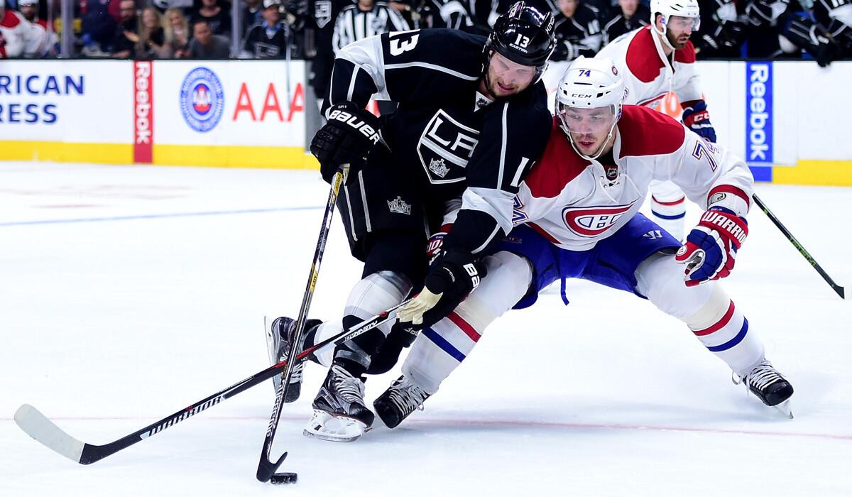 The Montreal Canadiens' Alexei Emelin, right, breaks up a chance for the Kings' Kyle Clifford during the second period at Staples Center on Thursday.