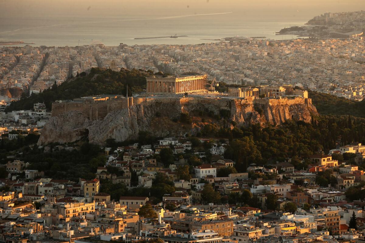 A view of the Acropolis Hill and the Parthenon from Lycabettus Hill on Wednesday in Athens. Eurozone leaders have offered the Greek government one more chance to propose a viable solution of its debt or face the possibility of a likely exit from the euro.
