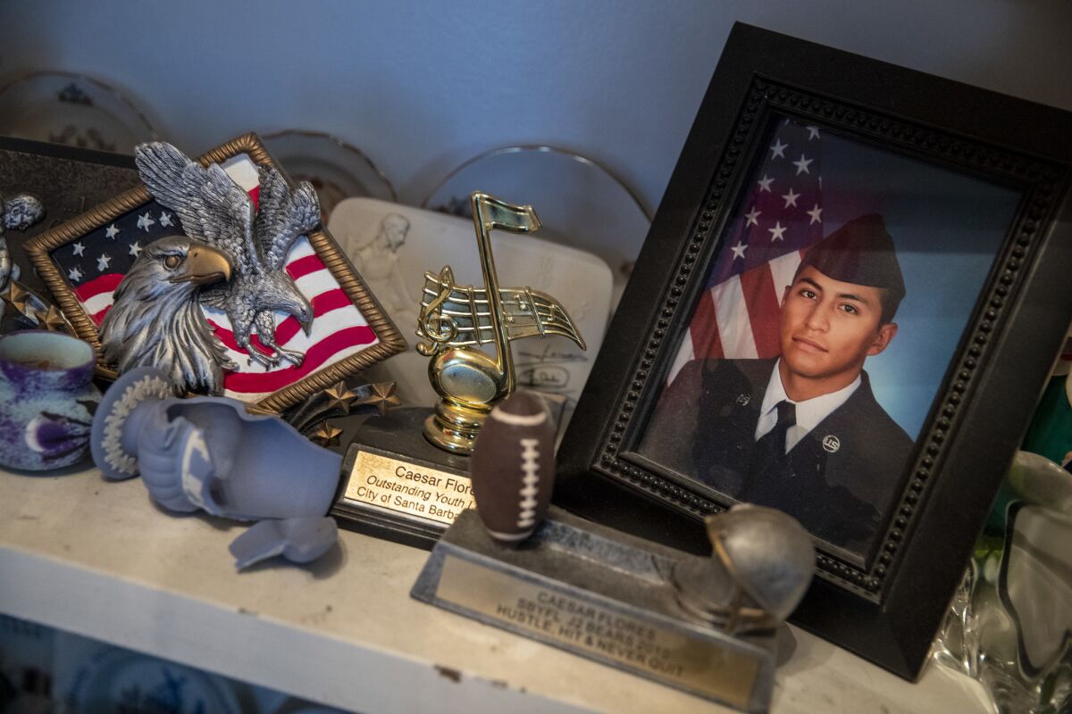 Portrait of Caesar Flores, who is serving in the Air Force in Texas, in a photo at the Flores family at their home in Goleta on June 26. His mother, Juana Flores, was deported earlier this year.