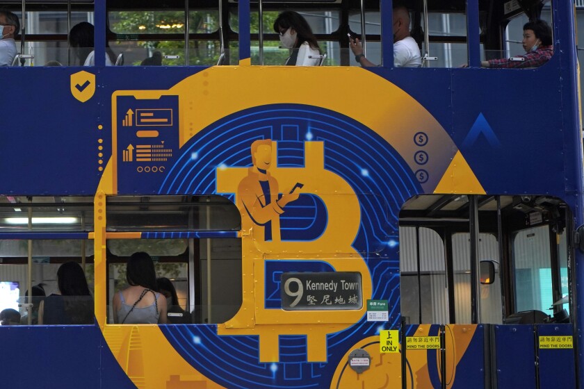 Bitcoin advertisement displayed on a tram in Hong Kong. 