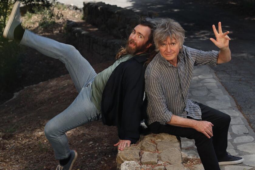 LOS ANGELES, CA-MAY 4, 2018: New Zealand musicians Liam Finn, left, and his father Neil Finn are photographed in Griffith Park on May 4, 2018. They have a new duo album titled, "Lightsleeper," coming August 24, 2018. (Mel Melcon/Los Angeles Times)