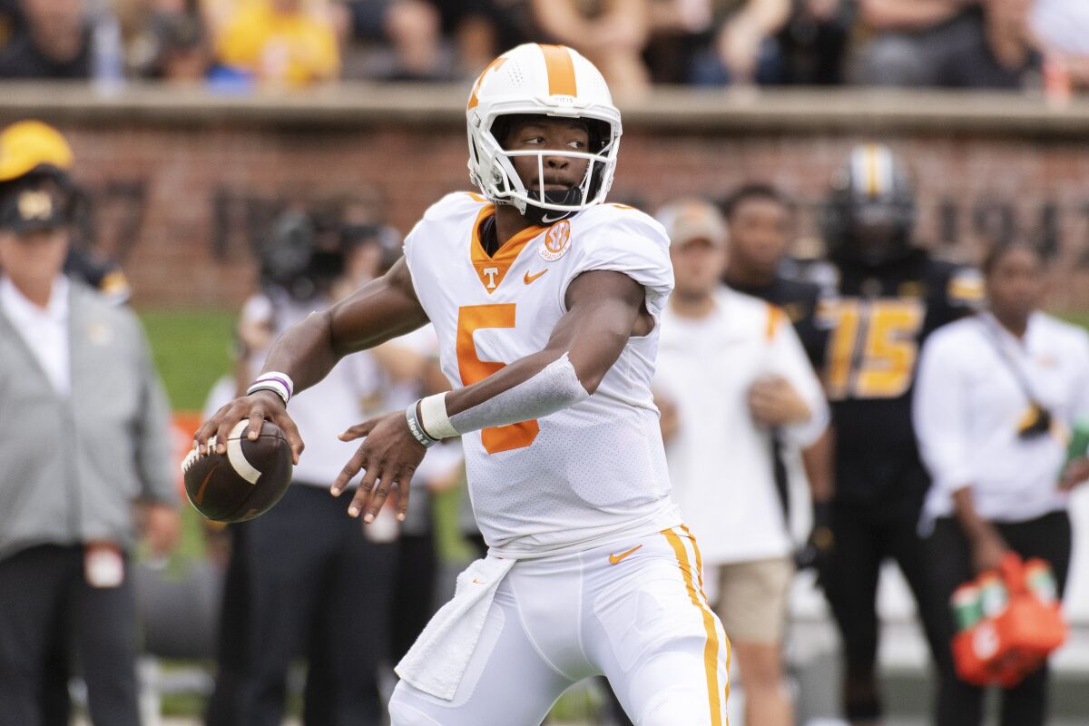 Tennessee quarterback Hendon Hooker throws a pass during the first half of an NCAA college football game against Missouri Saturday, Oct. 2, 2021, in Columbia, Mo. (AP Photo/L.G. Patterson)
