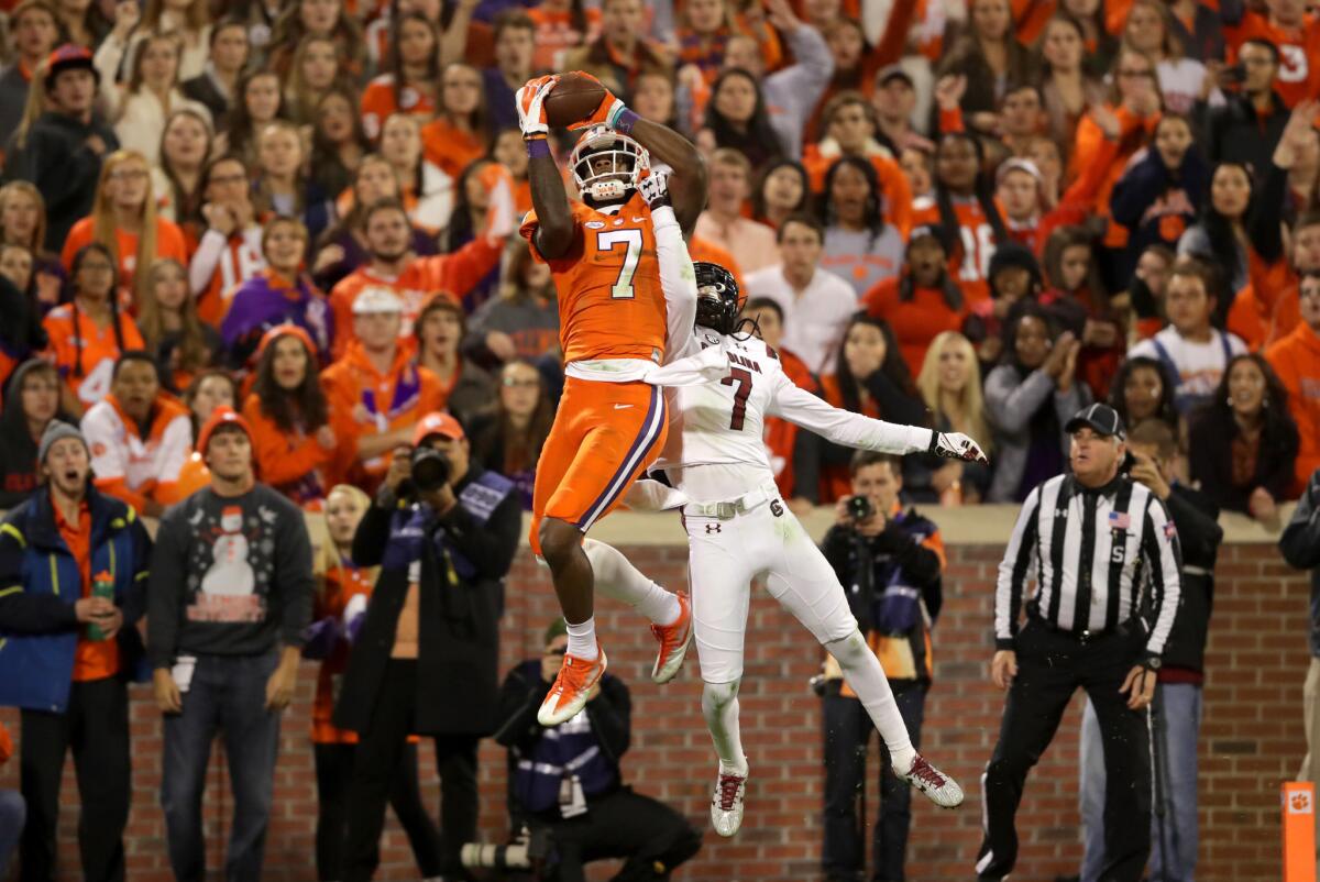Clemson wide receiver Mike Williams, left, makes a touchdown catch over South Carolina defensive back Jamarcus King during a game in November.