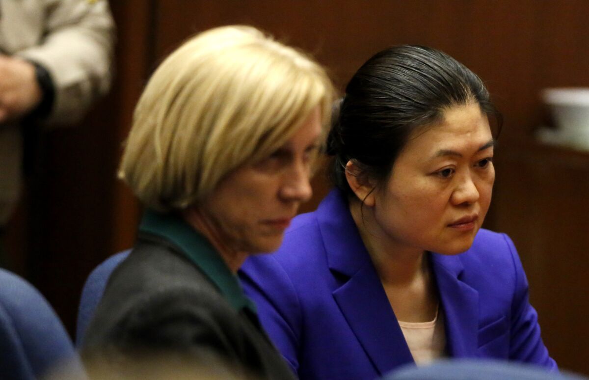Rowland Heights doctor Hsiu-Ying "Lisa" Tseng and her attorney Tracy Green, left, listen as Tseng was convicted of second-degree murder on Friday, for the drug-overdose deaths of three of her patients.