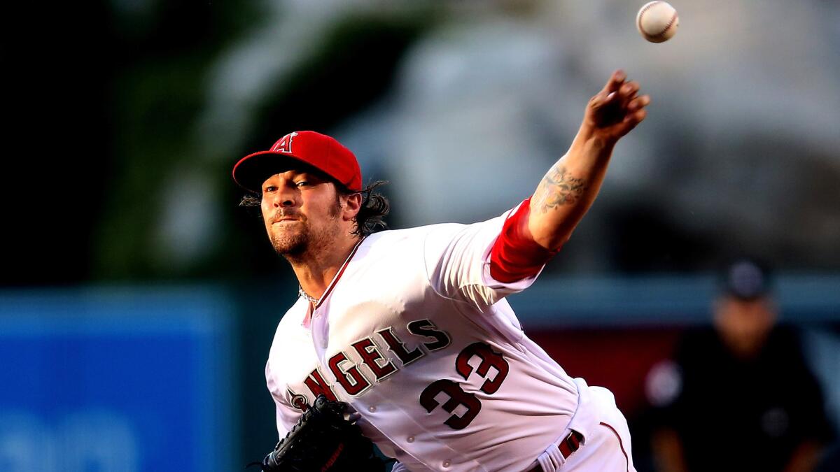 Angels starter C.J. Wilson pitched eight scoreless innings against the Red Sox on Friday night, giving up five hits and three walks while striking out four.