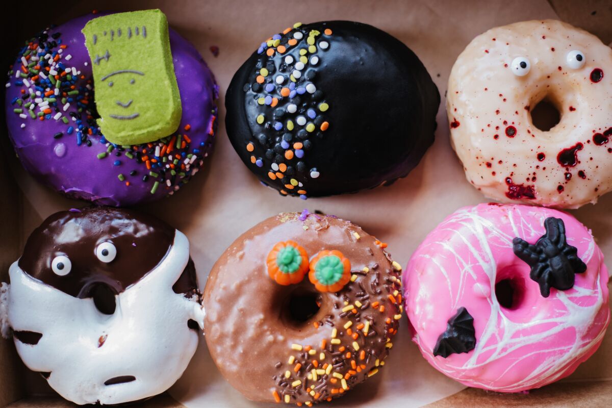 Halloween-inspired doughnuts available Oct. 26-31 at Devil's Dozen Donut Shop in Little Italy.