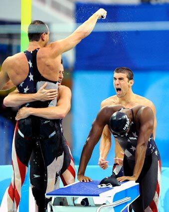 USA swimmers, from left, Jason Lezak, Garrett Weber-Gale, Michael Phelps and Cullen Jones celebrate their gold-medal win in the 400-meter freestyle relay at the 2008 Beijing Olympics.
