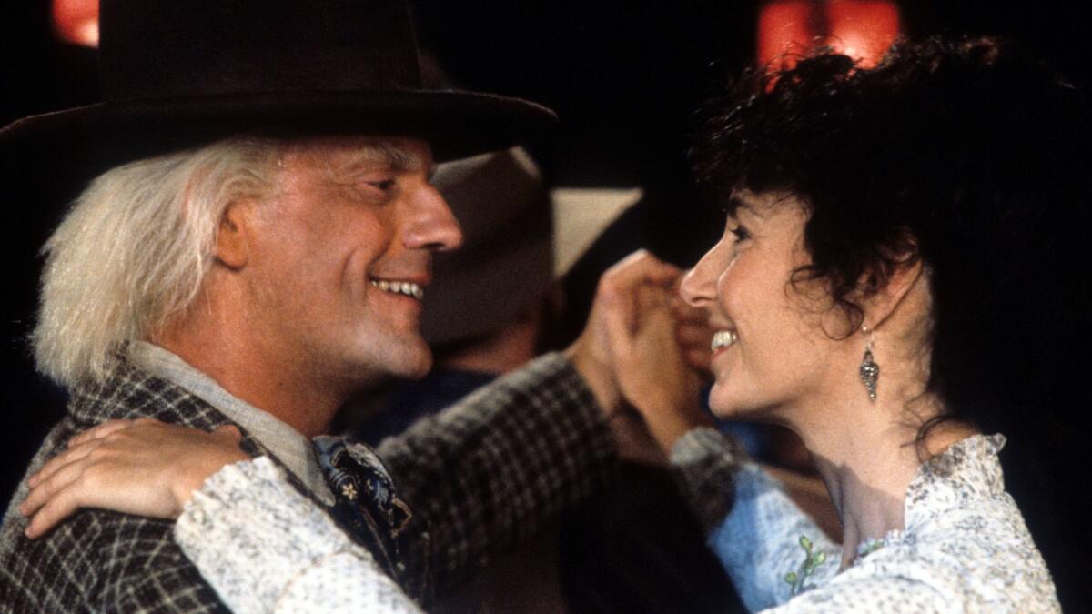 Christopher Lloyd and Mary Steenburgen dancing in a scene from the 1990 film "Back to the Future: Part III."