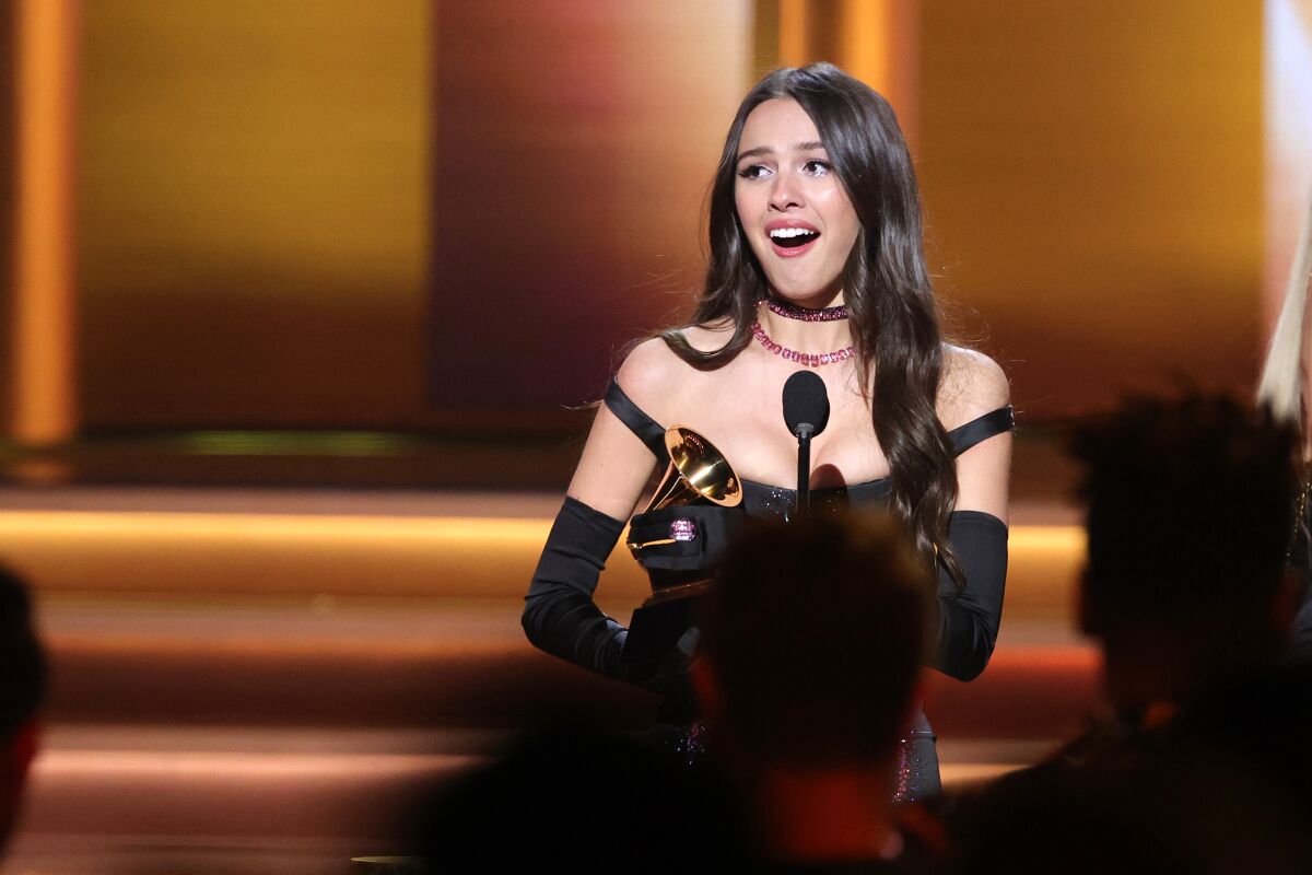 Olivia Rodrigo accepts the award for best new artist at the 64th Annual Grammy Awards.