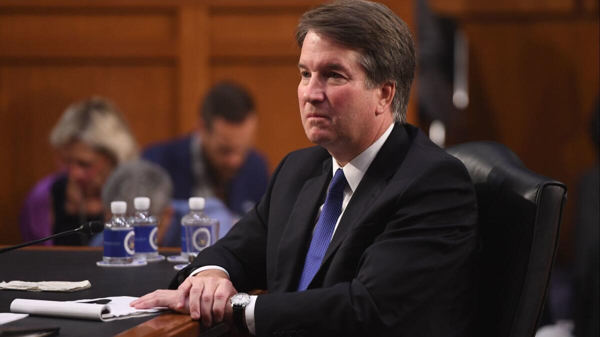 Brett Kavanaugh listens during his Sept. 4 Senate Judiciary Committee confirmation hearing to be a Supreme Court justice.