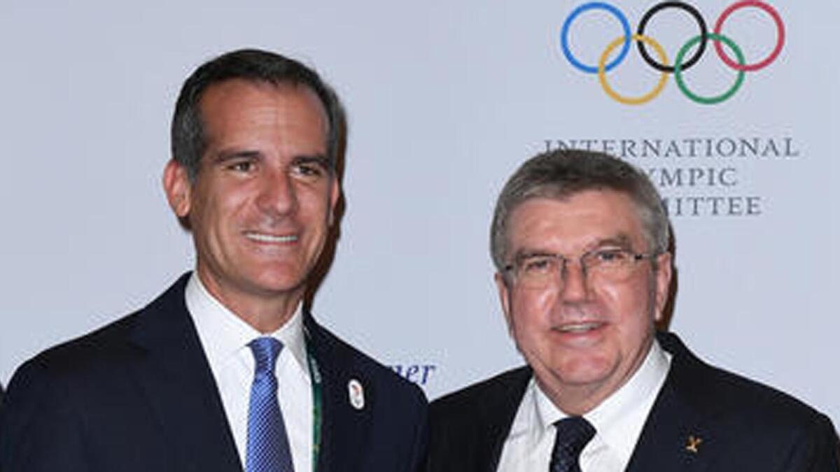 Mayor Eric Garcetti with International Olympic Committee President Thomas Bach in Rio de Janiero.