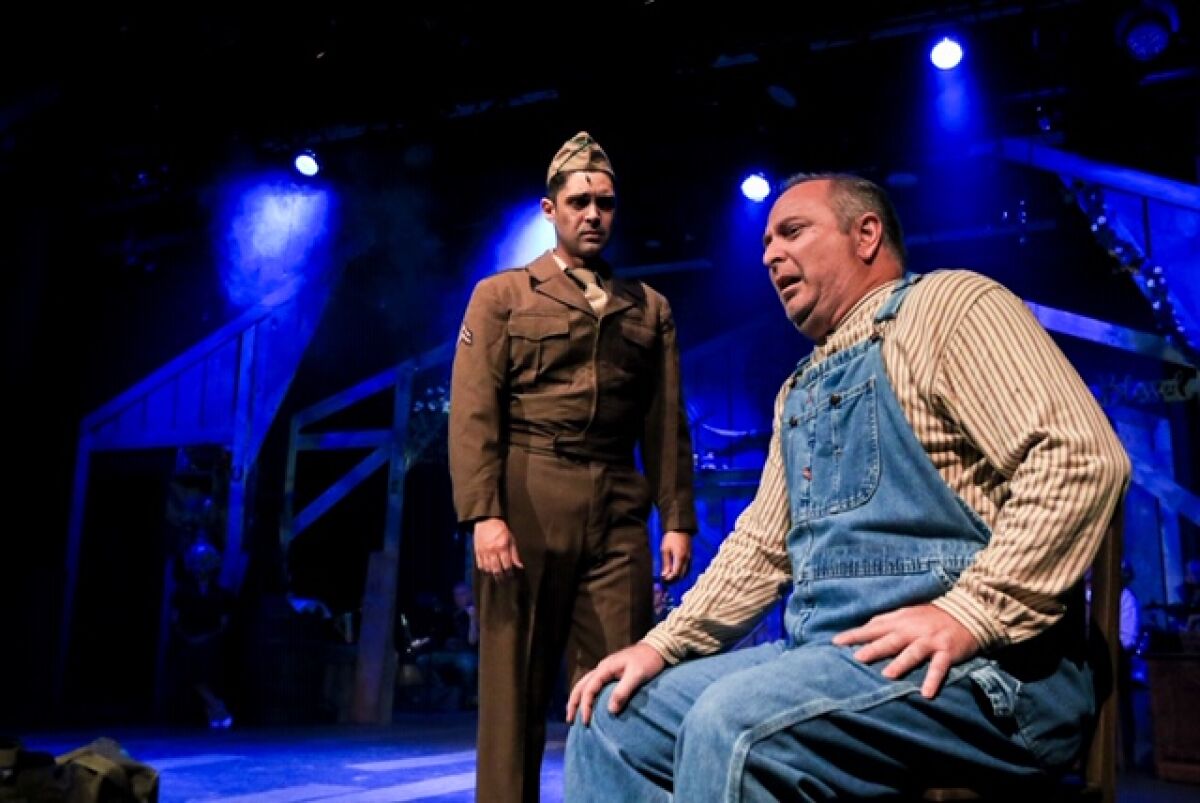 Billy Cane (Brandon Taylor Jones) returns home from the war to find his father (Duane Thomas) in GEM Theater's production of "Bright Star" in Garden Grove.