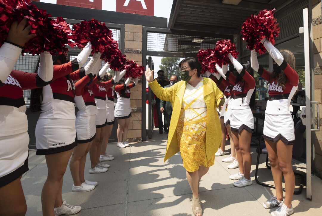 LAUSD Interim Superintendent Megan K. Reilly is greeted by cheerleaders upon arrival at Arleta High School in Arleta.
