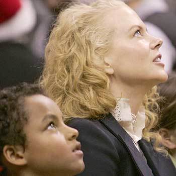Actress Nicole Kidman and her son Conor Anthony watch the Miami Heat take on the Los Angeles Lakers on Christmas Day.